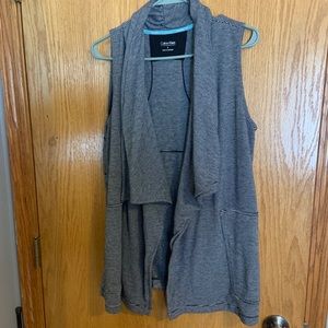 Calvin Klein performance vest. Black striped Large